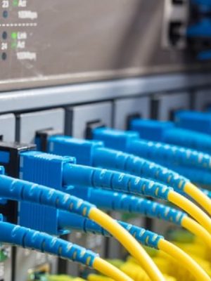 Fiber Optic cables connected to optic ports and UT